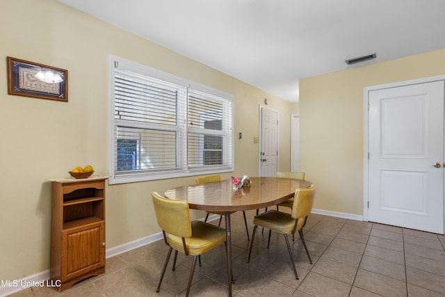 view of tiled dining space