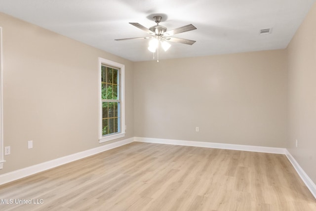 1304 Estelle St, Hattiesburg, MS 39402 - unfurnished room featuring light wood finished floors and a ceiling fan