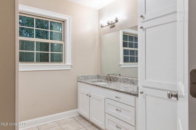 1304 Estelle St, Hattiesburg, MS 39402 - bathroom featuring vanity and tile patterned flooring