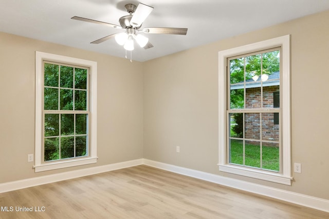 1304 Estelle St, Hattiesburg, MS 39402 - unfurnished room with healthy amount of natural light, light wood-style floors, and ceiling fan