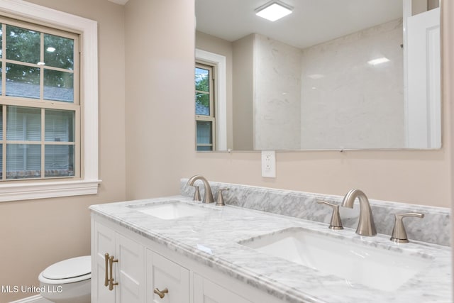 1304 Estelle St, Hattiesburg, MS 39402 - bathroom with toilet and double vanity