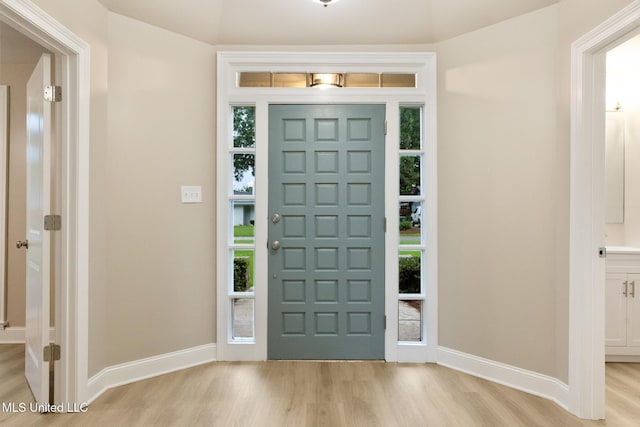 1304 Estelle St, Hattiesburg, MS 39402 - entrance foyer with light wood-style floors and healthy amount of natural light