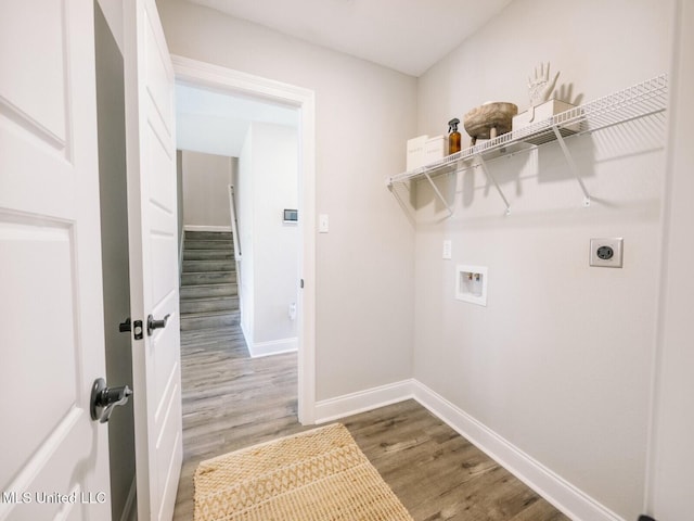 9668 W Oaklawn Rd, Biloxi, MS 39532 - laundry area with electric dryer hookup, hookup for a washing machine, and wood finished floors