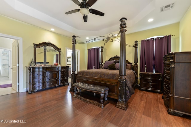 bedroom featuring visible vents, wood finished floors, and recessed lighting