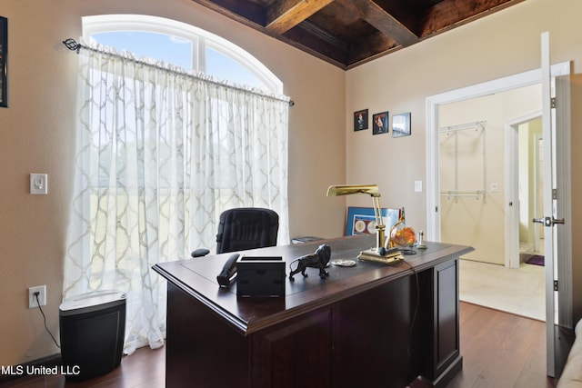 office featuring beam ceiling, dark wood-type flooring, and coffered ceiling