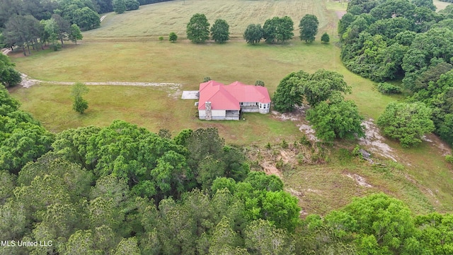 birds eye view of property featuring a rural view