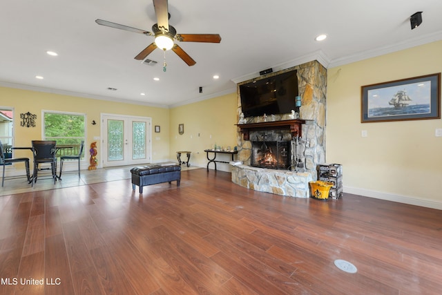 game room with recessed lighting, wood finished floors, a ceiling fan, and a fireplace