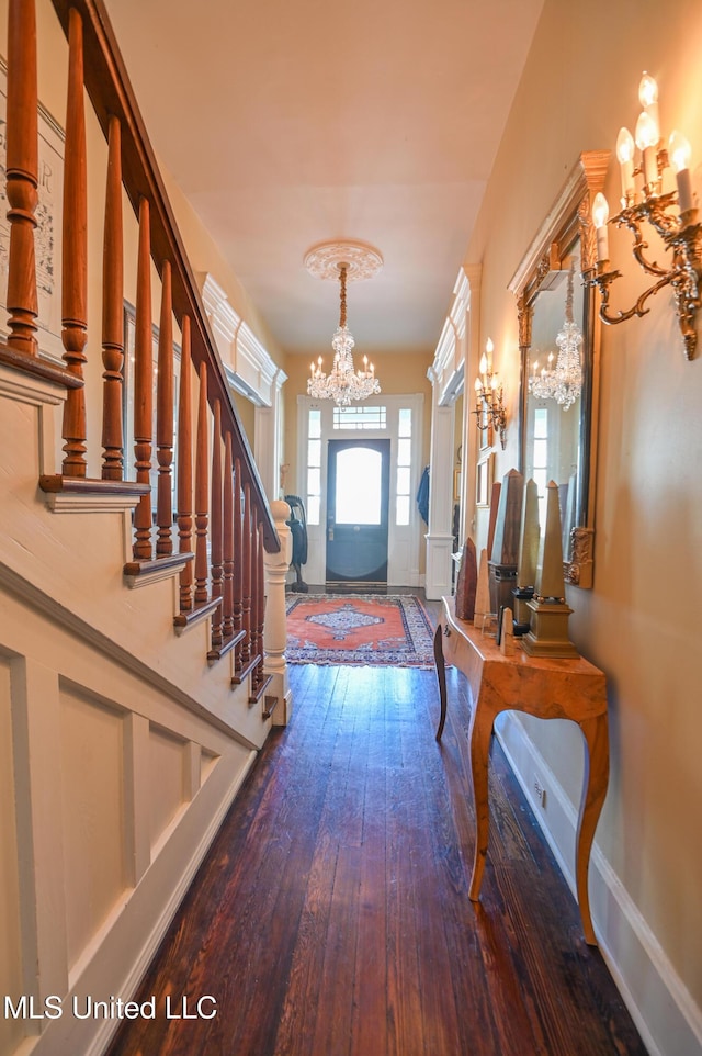 204 Arlington Ave, Natchez, MS 39120 - foyer featuring a chandelier, hardwood / wood-style floors, and stairway