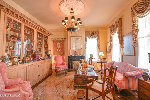 204 Arlington Ave, Natchez, MS 39120 - sitting room featuring plenty of natural light, a chandelier, and wood finished floors