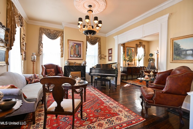204 Arlington Ave, Natchez, MS 39120 - living area featuring a chandelier, hardwood / wood-style floors, and crown molding