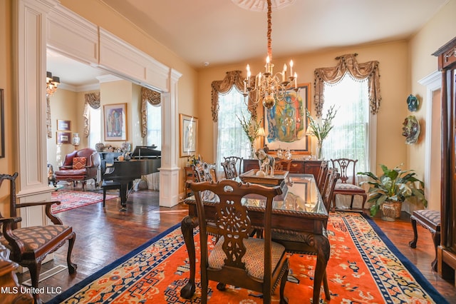 204 Arlington Ave, Natchez, MS 39120 - dining space featuring a chandelier, dark wood-style flooring, and ornamental molding