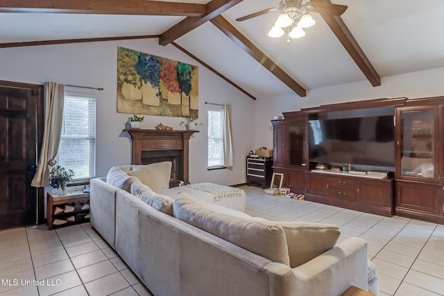 2213 N St, Gulfport, MS 39507 - living area featuring light tile patterned flooring, a ceiling fan, and a fireplace