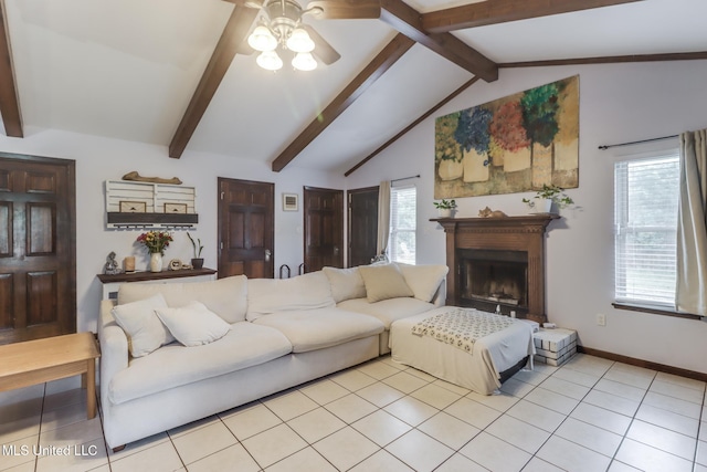 2213 N St, Gulfport, MS 39507 - living room with a ceiling fan, light tile patterned flooring, a fireplace, and baseboards