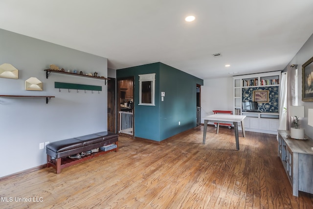 2213 N St, Gulfport, MS 39507 - recreation room featuring wood finished floors, recessed lighting, and baseboards