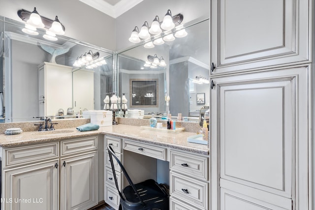 bathroom featuring vanity and crown molding