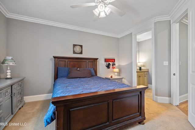 carpeted bedroom featuring ensuite bath, crown molding, and ceiling fan