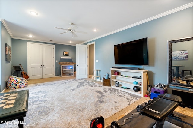 living room with crown molding and ceiling fan