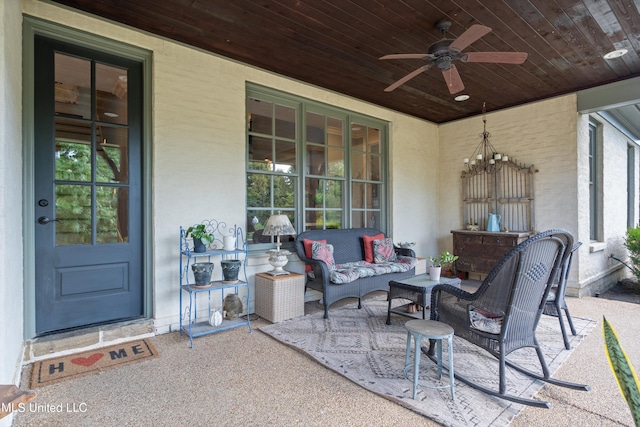 view of patio featuring an outdoor hangout area and ceiling fan