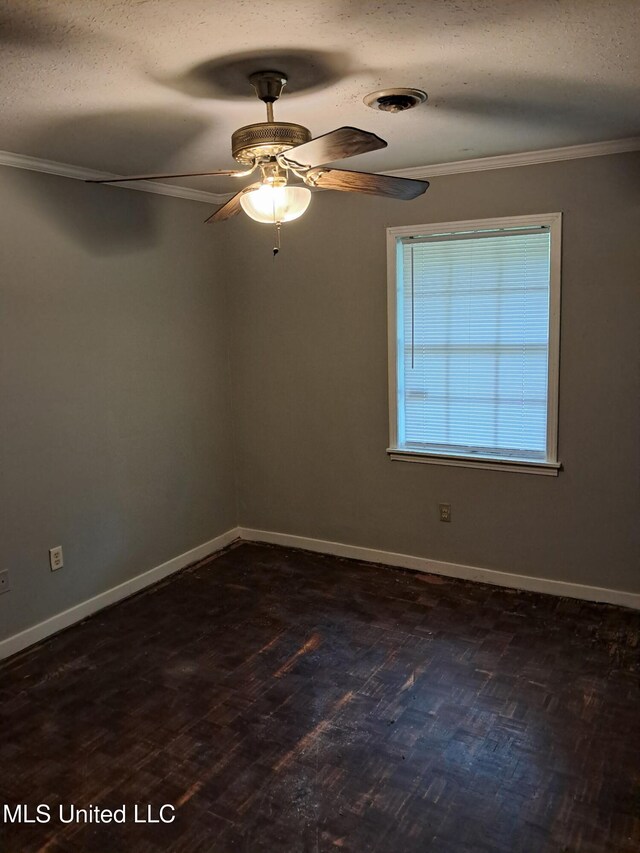 2943 Suncrest Dr, Jackson, MS 39212 - unfurnished room with ornamental molding, baseboards, ceiling fan, a textured ceiling, and dark wood-style flooring