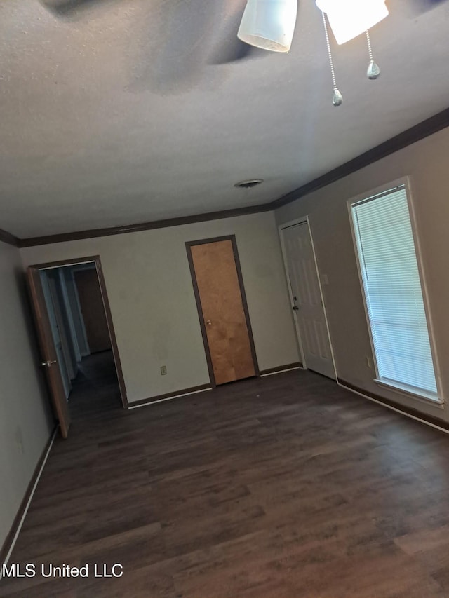 2943 Suncrest Dr, Jackson, MS 39212 - unfurnished room featuring ornamental molding, dark wood finished floors, and baseboards