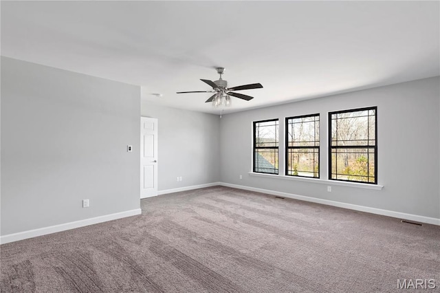 1 Hadleigh, Windsor Park, Lake St Louis, MO 63367 - spare room with carpet floors, baseboards, and a ceiling fan