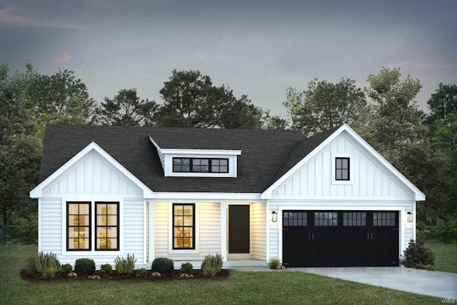 1 Rockport Smt, At Park Hill, Troy, MO 63379 - modern farmhouse with board and batten siding, driveway, a garage, a front yard, and a shingled roof