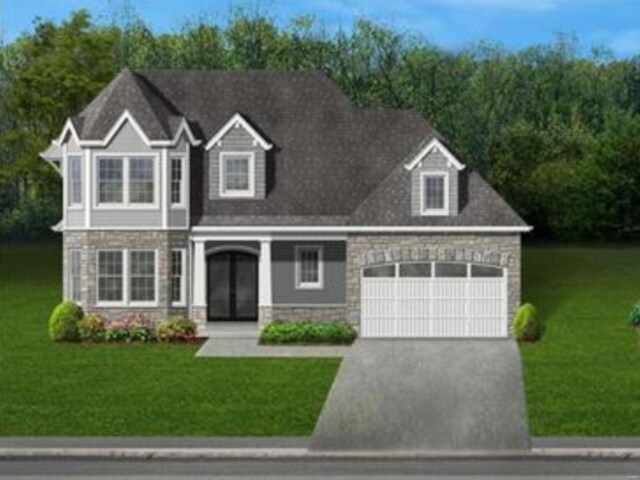 36 Ponca Trl, Kirkwood, MO 63122 - view of front of property featuring stone siding, an attached garage, driveway, and a front lawn