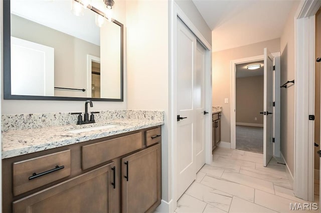712 Silver Buck Ln, Chesterfield, MO 63005 - bathroom with marble look tiles and vanity