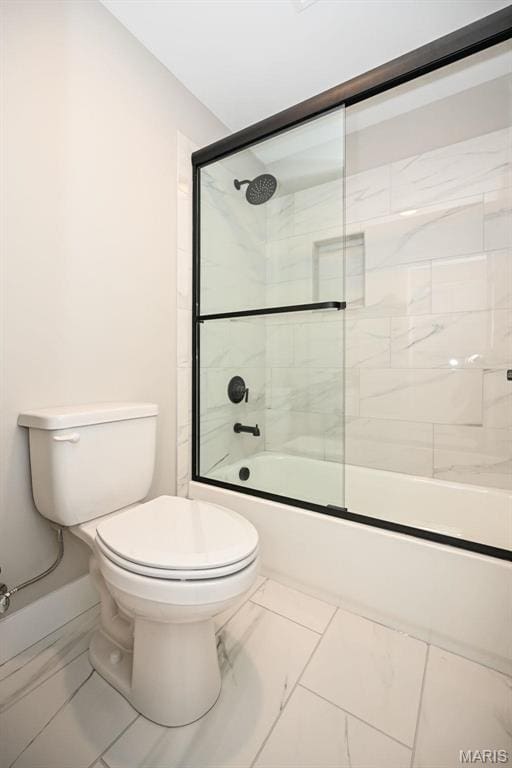 712 Silver Buck Ln, Chesterfield, MO 63005 - bathroom featuring marble look tiles and enclosed tub / shower combo