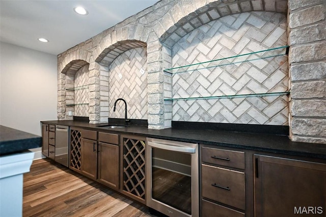 712 Silver Buck Ln, Chesterfield, MO 63005 - indoor wet bar with wine cooler, dishwasher, wood finished floors, recessed lighting, and tasteful backsplash