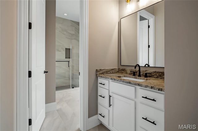 724 Silver Buck Ln, Chesterfield, MO 63005 - full bath featuring marble finish flooring, a marble finish shower, vanity, and recessed lighting