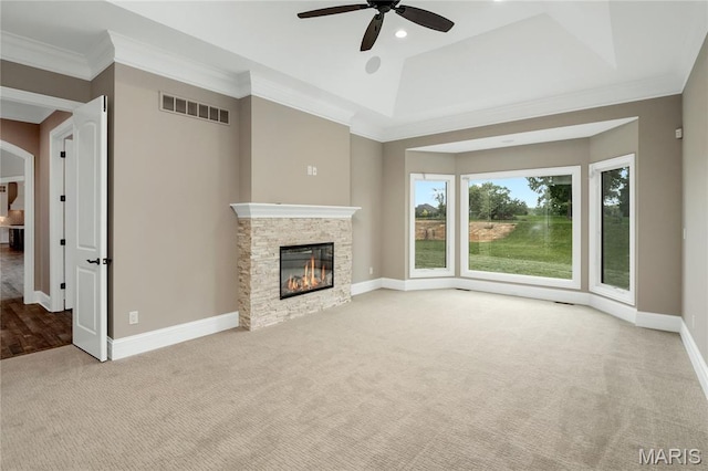 724 Silver Buck Ln, Chesterfield, MO 63005 - unfurnished living room with carpet floors, ceiling fan, a fireplace, ornamental molding, and arched walkways