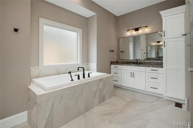 724 Silver Buck Ln, Chesterfield, MO 63005 - full bath with vanity, a bath, and marble finish flooring