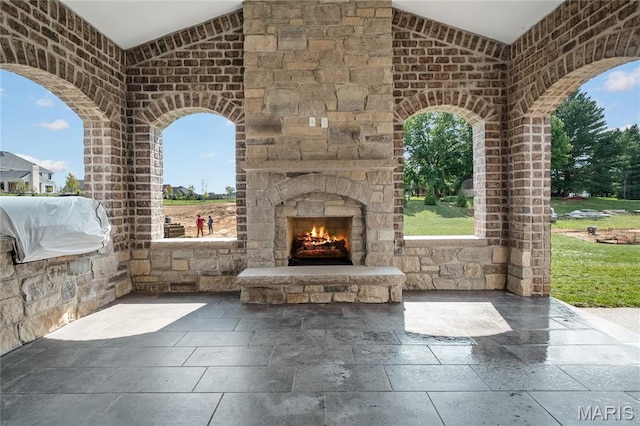 724 Silver Buck Ln, Chesterfield, MO 63005 - view of patio / terrace featuring an outdoor stone fireplace