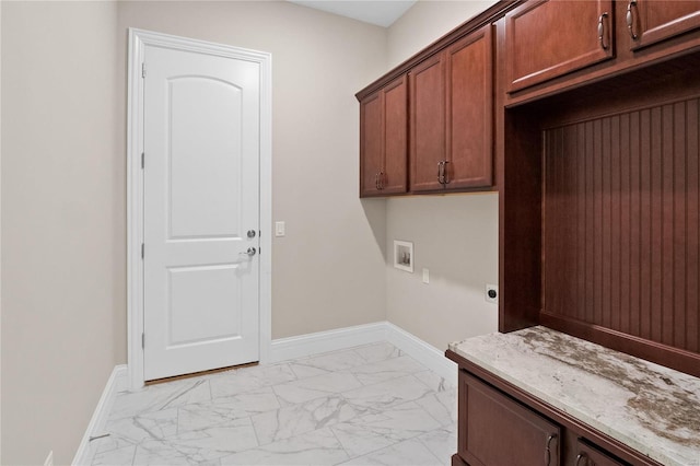 744 Silver Buck Ln, Chesterfield, MO 63005 - laundry room with light marble finish floors, cabinet space, washer hookup, hookup for an electric dryer, and baseboards