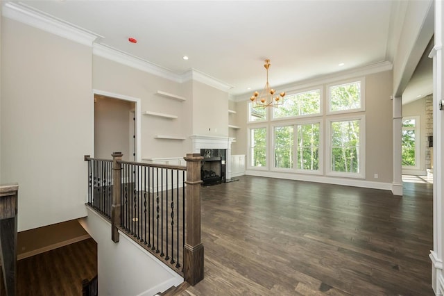 living room with crown molding, a chandelier, dark wood-style flooring, baseboards, and recessed lighting