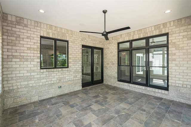 view of patio / terrace with french doors and ceiling fan