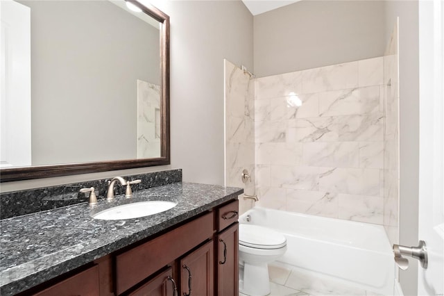 bathroom with toilet, vanity, and shower / bathtub combination