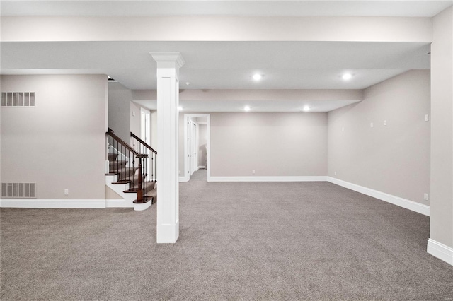 finished basement with carpet, baseboards, stairway, and recessed lighting