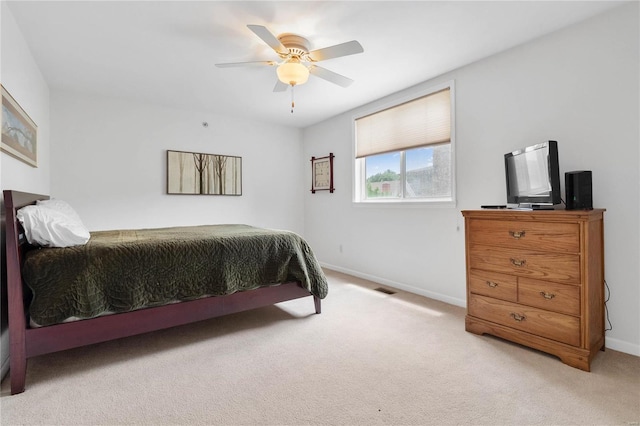 505 N And S Rd Unit 3C, University City, MO 63130 - bedroom with light colored carpet, baseboards, and ceiling fan