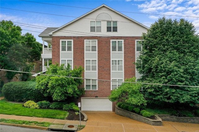 505 N And S Rd Unit 3C, University City, MO 63130 - view of front facade featuring brick siding and an attached garage
