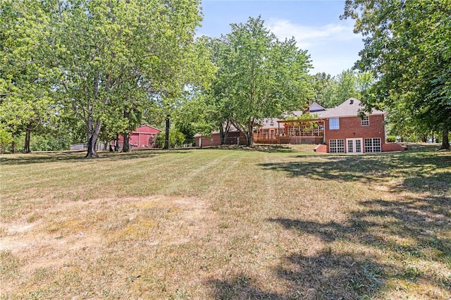 4239 Carter Rte Unit B, Ellsinore, MO 63937 - view of green lawn with a wooden deck and french doors