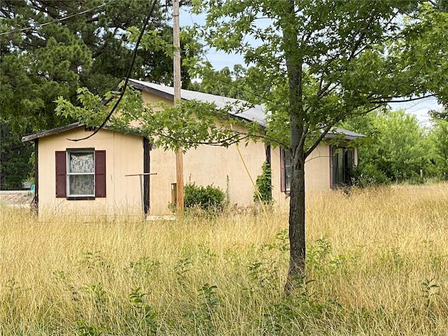 22164 State Route Kk, St James, MO 65559 - view of property exterior featuring stucco siding