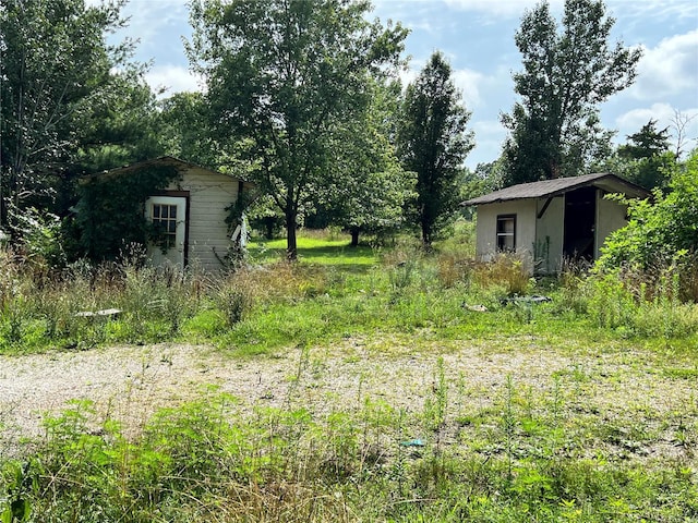 22164 State Route Kk, St James, MO 65559 - view of yard with an outdoor structure and a shed