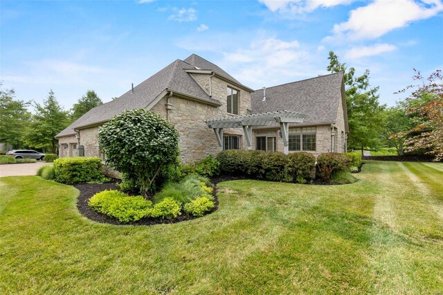 111 Crosshill Ct, Cape Girardeau, MO 63701 - view of home's exterior featuring stone siding, a pergola, and a lawn
