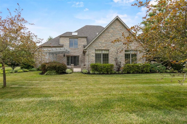 111 Crosshill Ct, Cape Girardeau, MO 63701 - rear view of property featuring stone siding, a lawn, and a pergola