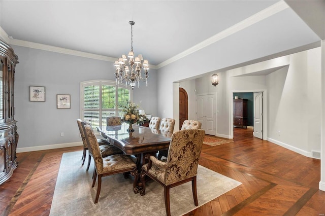 111 Crosshill Ct, Cape Girardeau, MO 63701 - dining area featuring baseboards, a chandelier, crown molding, arched walkways, and dark wood-type flooring