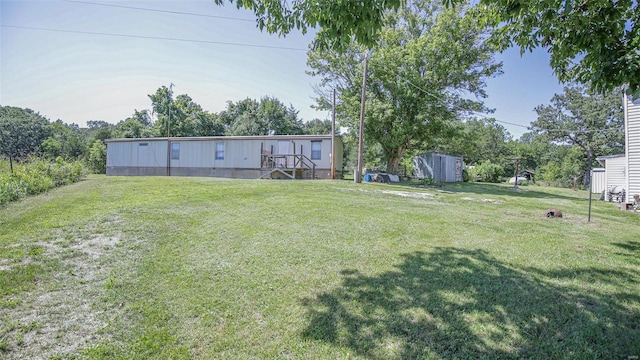 3340 Stonehouse Rd, De Soto, MO 63020 - view of grassy yard featuring an outdoor structure and a storage unit