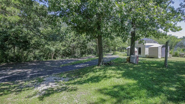 3340 Stonehouse Rd, De Soto, MO 63020 - view of grassy yard featuring an outdoor structure