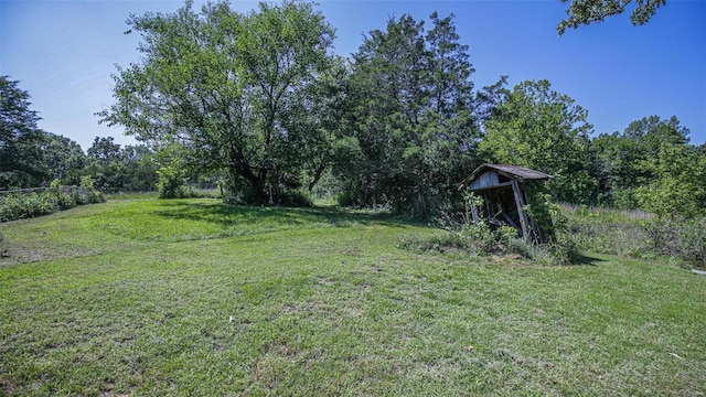 3340 Stonehouse Rd, De Soto, MO 63020 - view of green lawn with an outbuilding and a shed